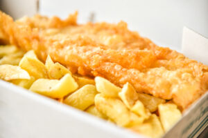 Fish and chips, traditional British food in white box